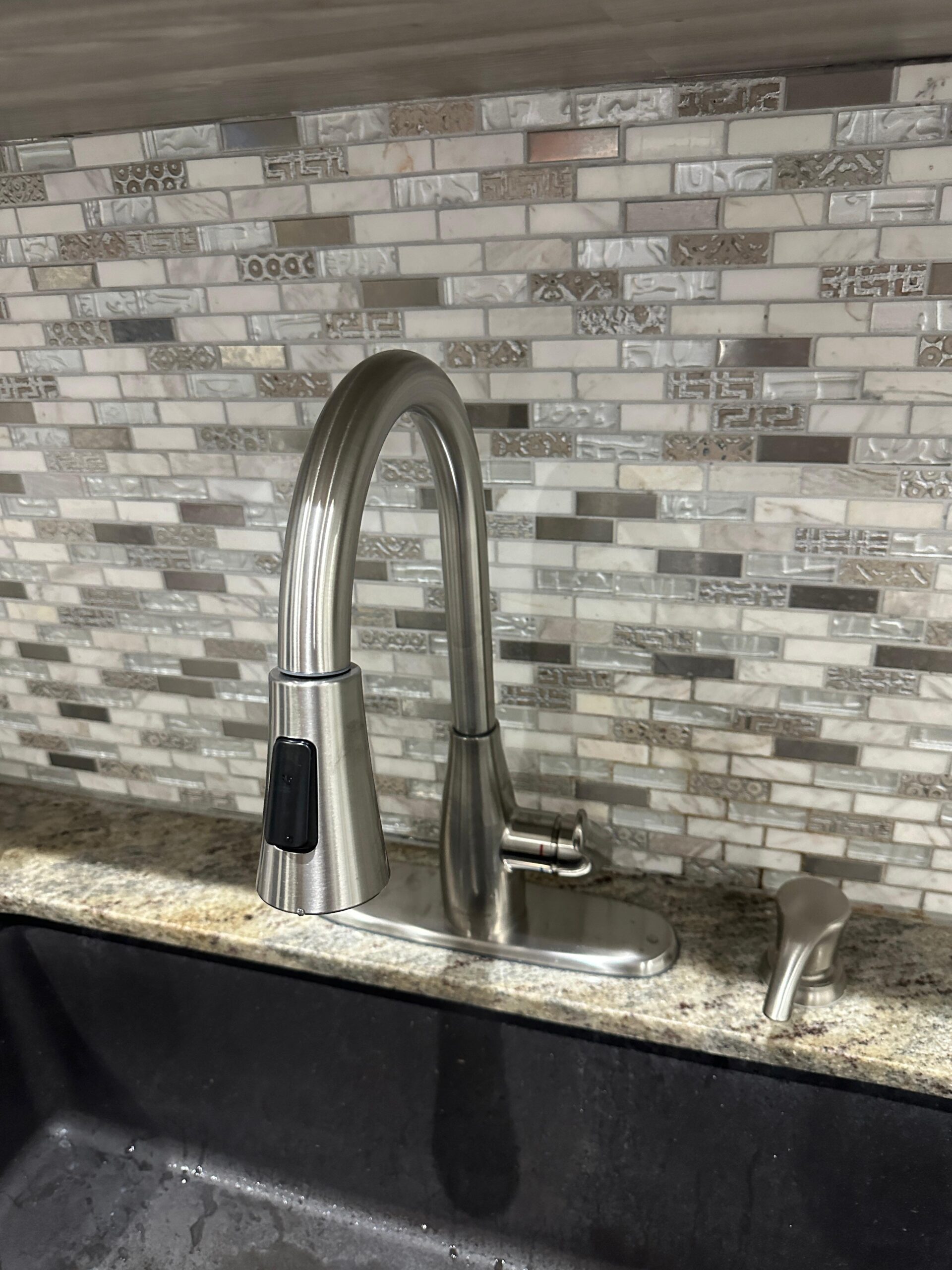 kitchen faucet replacement after